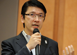 下間 康行